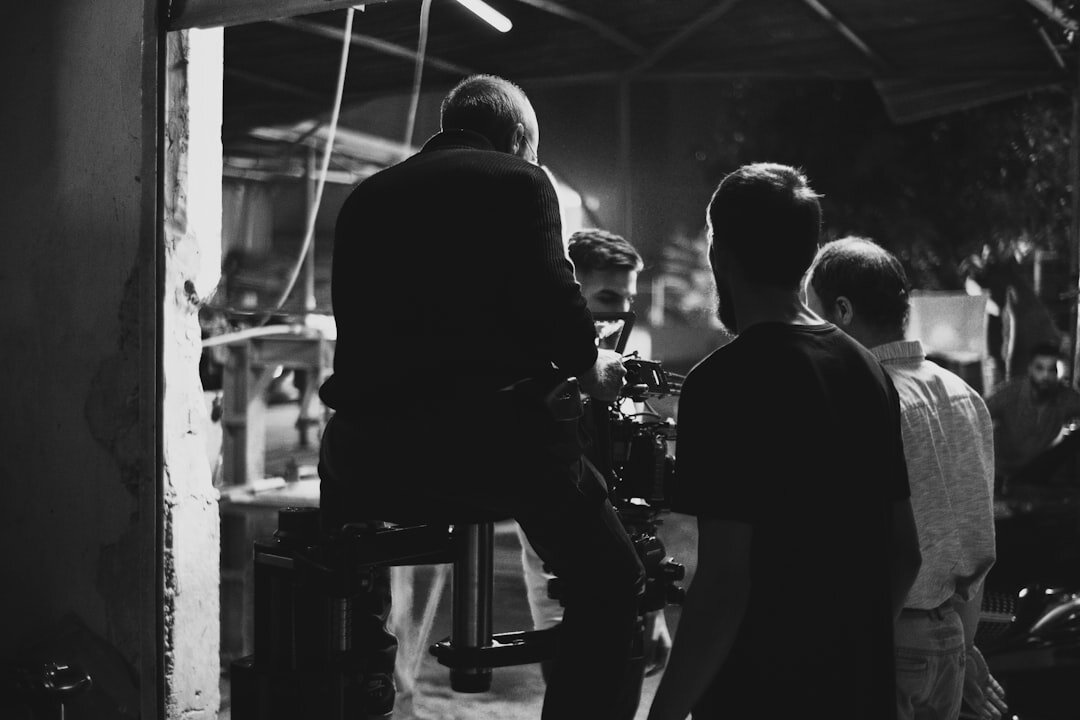 Production crew setting up cameras and lights before a live show