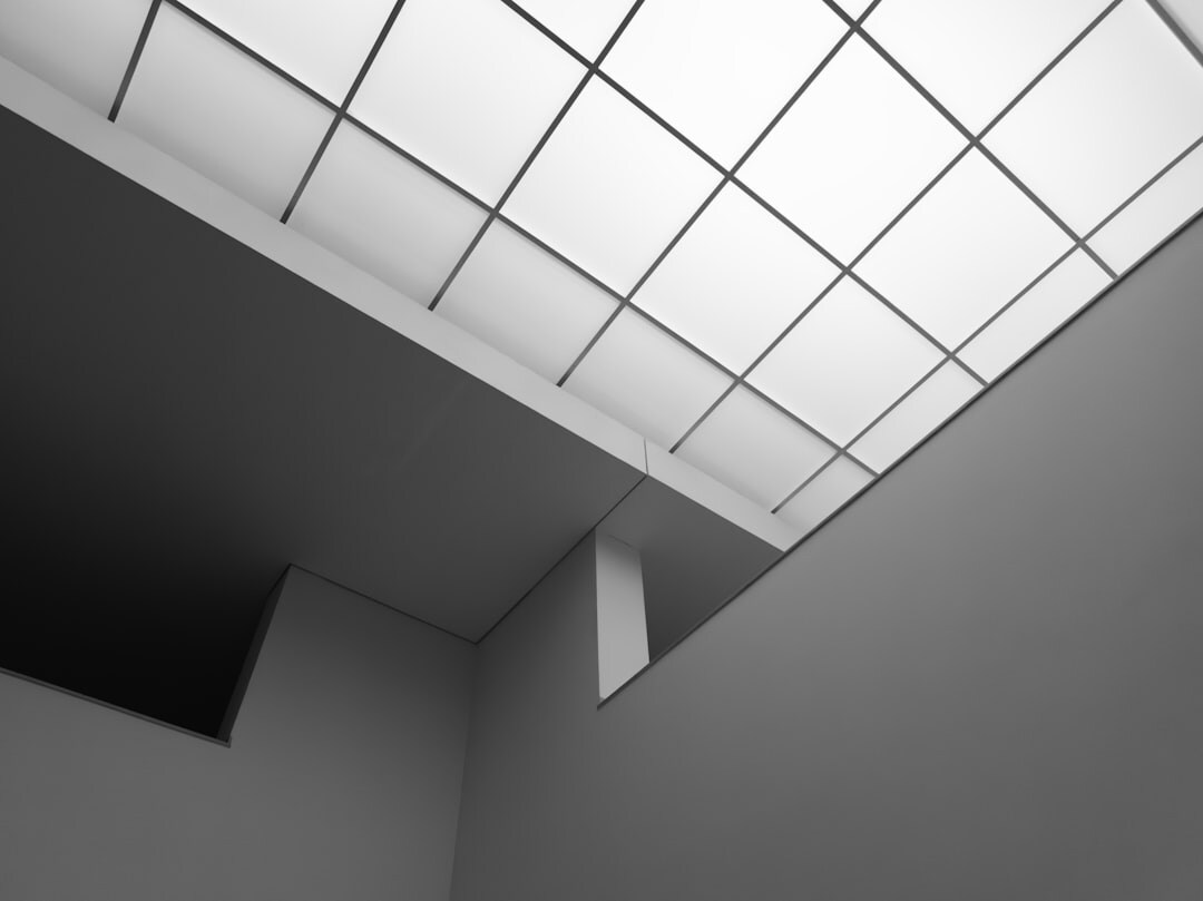Studio lighting fixtures and softboxes rigged on a grid